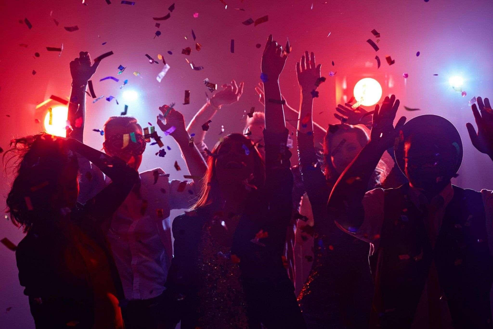 People dancing at a coffee rave in a café